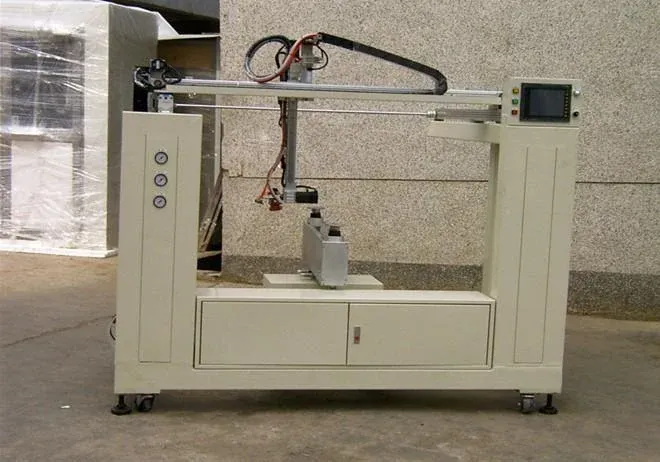 Five-axis spray machine used on an XFS Equipment furniture coating system